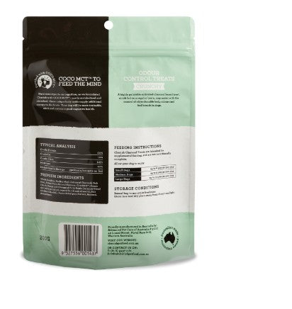 Back view of a green pet food packaging with text and labels.