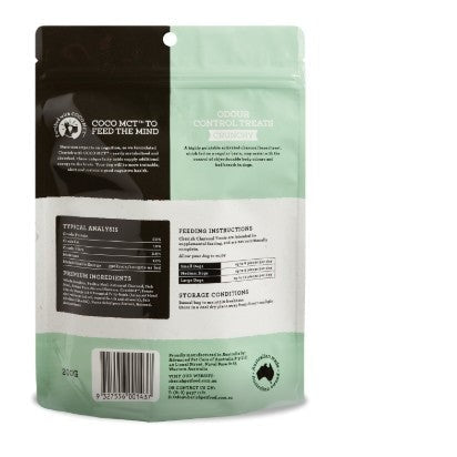 Back view of a green pet food packaging with text and labels.