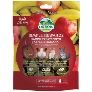 Oxbow Simple Rewards baked treats packaging with apples and bananas in the background