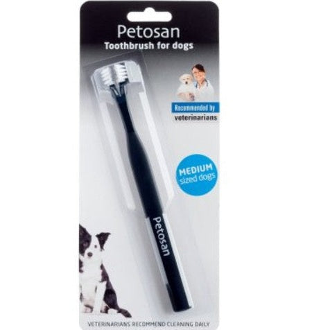 Petosan toothbrush for dogs in packaging with a dog illustration on a white background