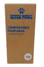 Box of Ocean Paws compostable poop bags with a brown cardboard box and blue text.