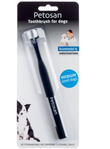 Petosan toothbrush for dogs in packaging with a dog illustration on a white background