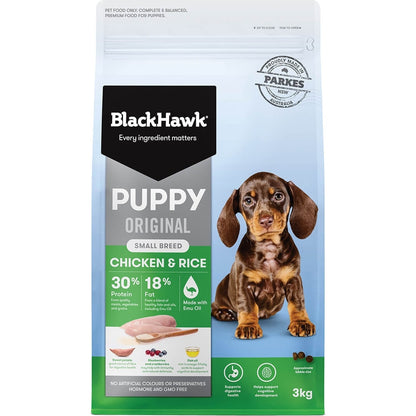A package of Black Hawk K9 small breed puppy dog food with chicken and rice flavor, featuring an image of a small brown and white dog on the front.